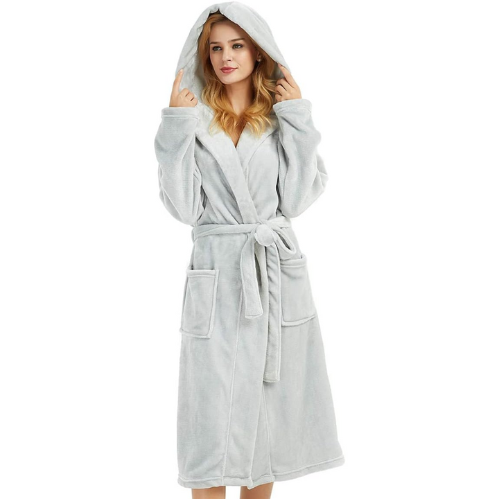 Luxurious women's fleece bathrobe with hood and pockets, soft and practical.