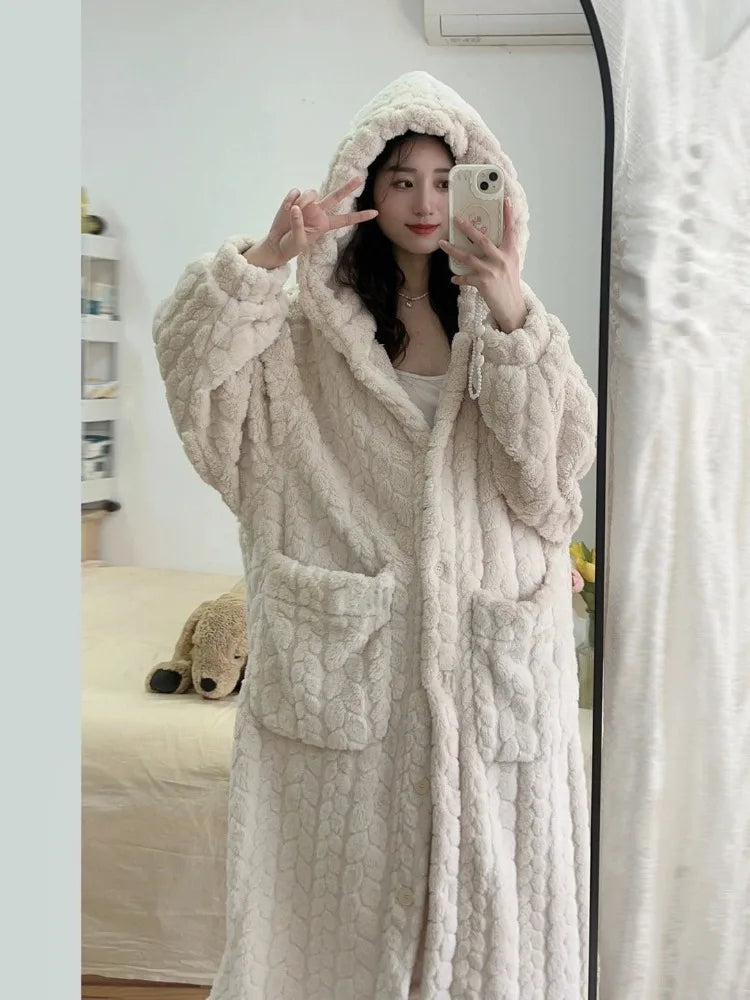 Women's plush hooded bathrobe, perfect for cozy winter loungewear. Soft and warm Amy Nightfall comfort.