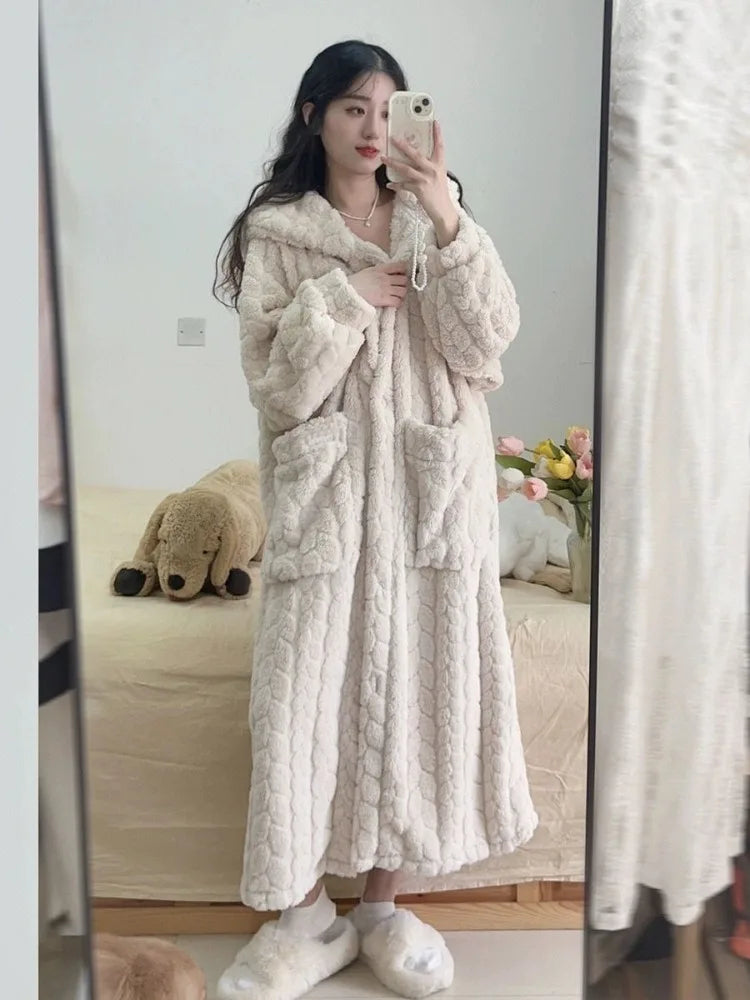 Cozy women's hooded plush bathrobe, ideal for warm winter relaxation & home wear. Soft loungewear gift.