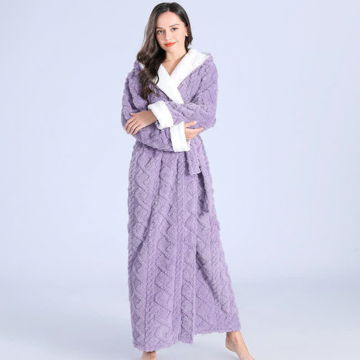 Luxurious women's hooded flannel bathrobe with plush coral fleece. Experience ultimate warmth & softness in this long winter robe.