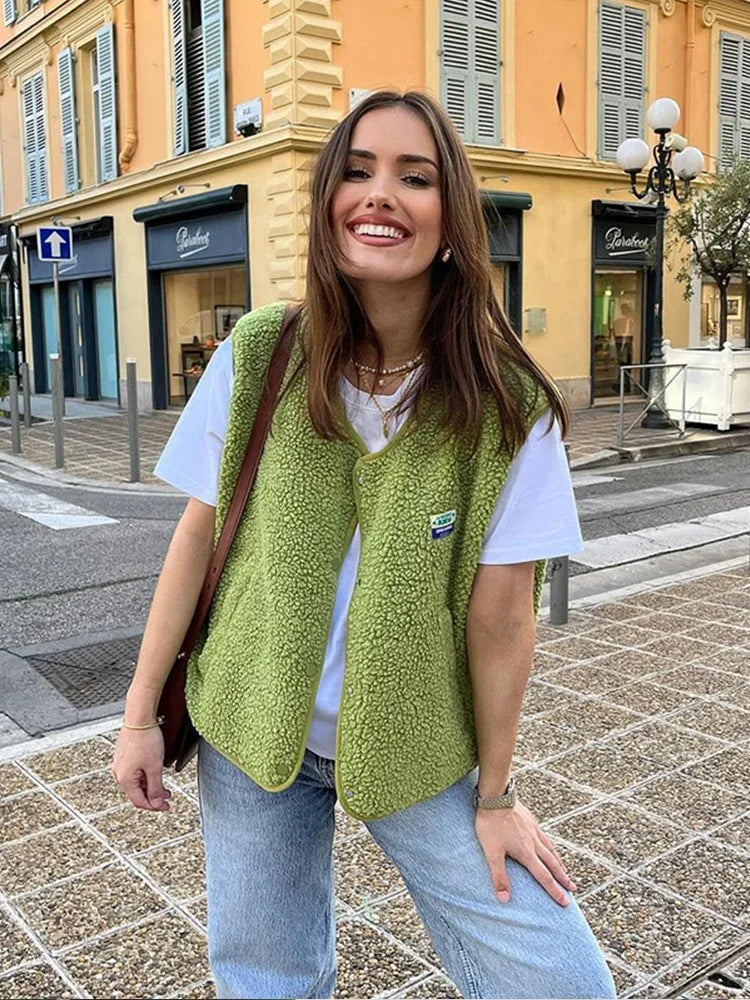 Women's plush layering vest in a soft green, perfect for cozy casual comfort and everyday fashion.