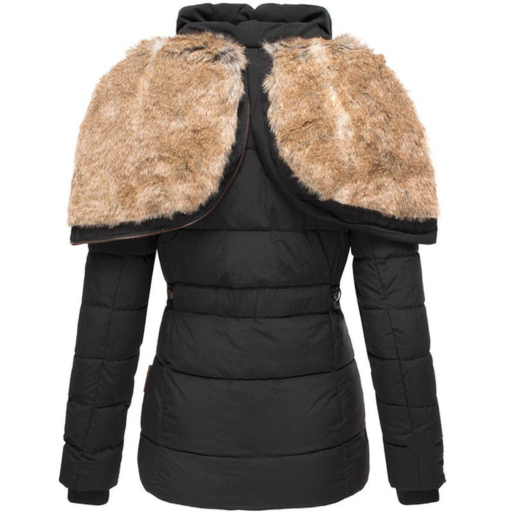 Stylish women's plush puffer jacket, warm winter coat with a comfortable quilted design.