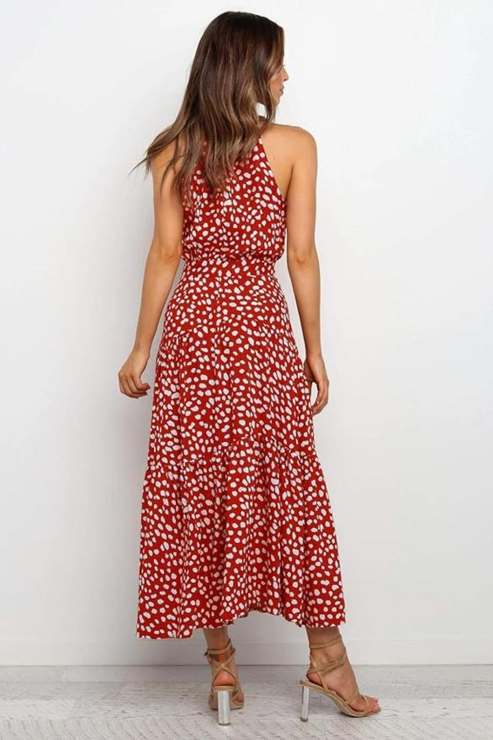 Versatile women's polka dot halter midi dress. Casual elegance for summer, suitable for various daytime events.