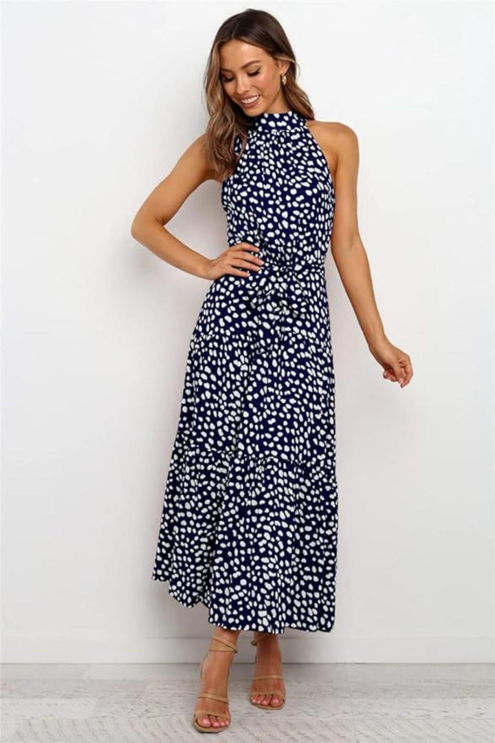 Red polka dot halter midi summer dress for women. Stylish fit & flare for casual or elegant daytime fashion.