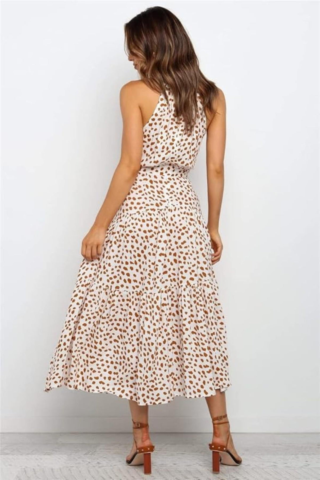 Women's summer midi dress: polka dot halter neck. Ideal for casual daytime wear with an elegant fit & flare.