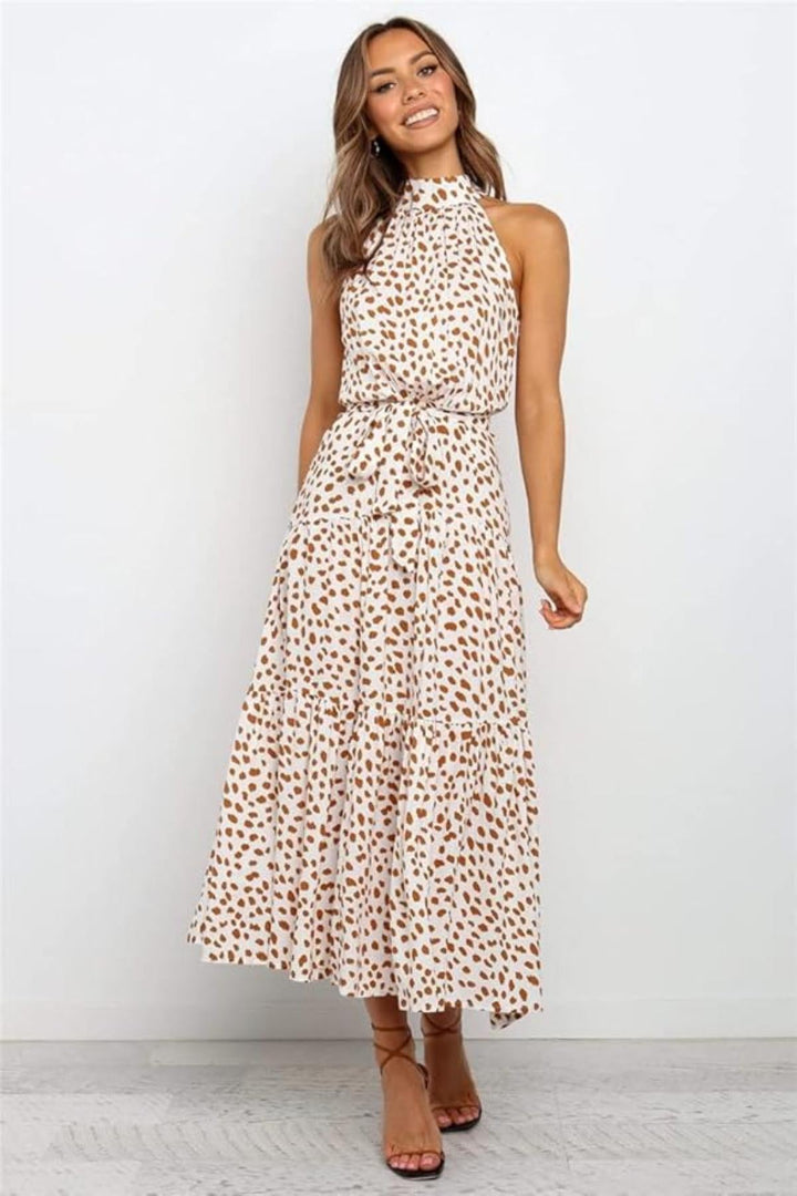 Navy blue polka dot halter midi dress. Women's elegant summer fashion, perfect fit & flare for daytime wear.