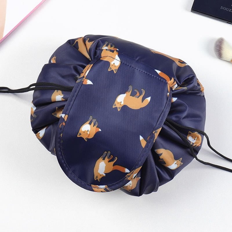 Closed, compact drawstring travel organizer for women's beauty essentials on the go.