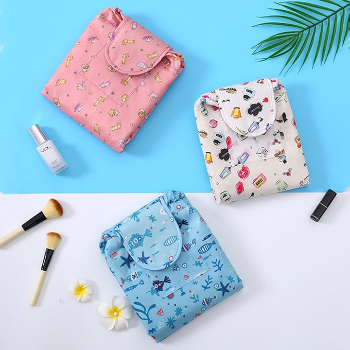 Convenient women's portable makeup organizer. Drawstring closure for easy access & quick packing.