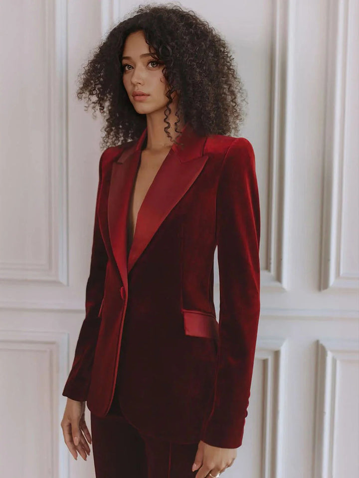 Chic women's workwear set featuring a tailored blazer & high-waisted flare trousers. Office fashion.