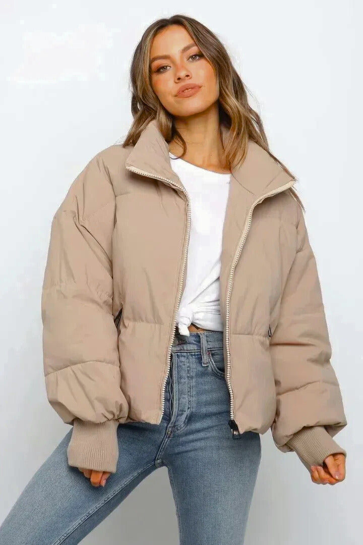Women's quilted puffer jacket, short cropped design for fall & winter fashion. Stylish & warm casual outerwear.
