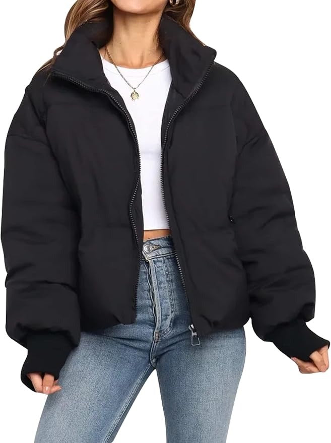 Back view of a women's short quilted puffer jacket, sleek cropped design, perfect everyday outerwear.