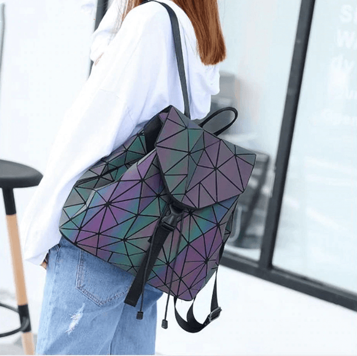 Unique women's color-changing backpack, reflective geometric design for a truly luminous fashion statement.