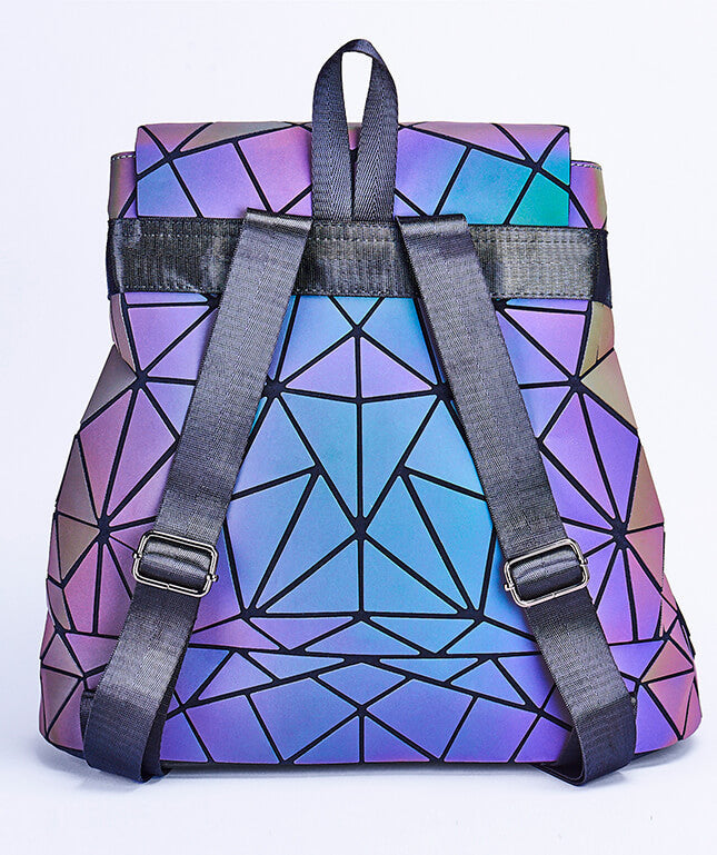 Fashionable women's reflective geometric backpack, showing its captivating color-changing effect.