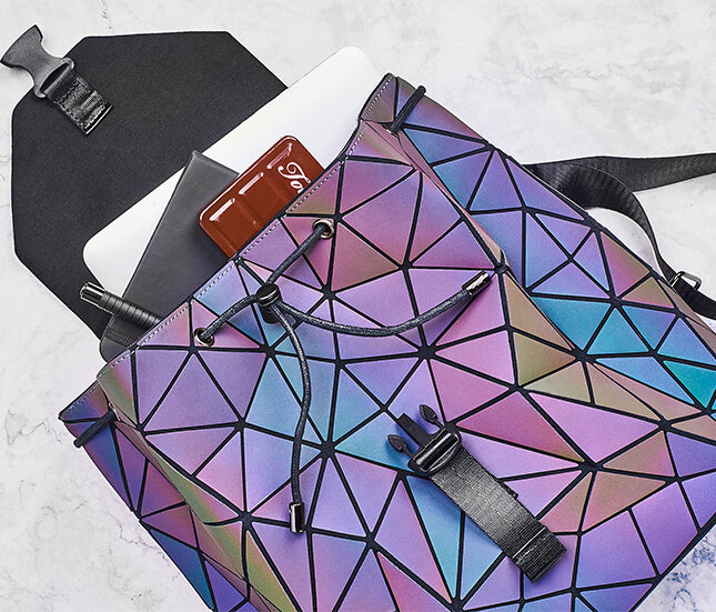 Close-up of the reflective geometric design on a women's color-changing luminous backpack.