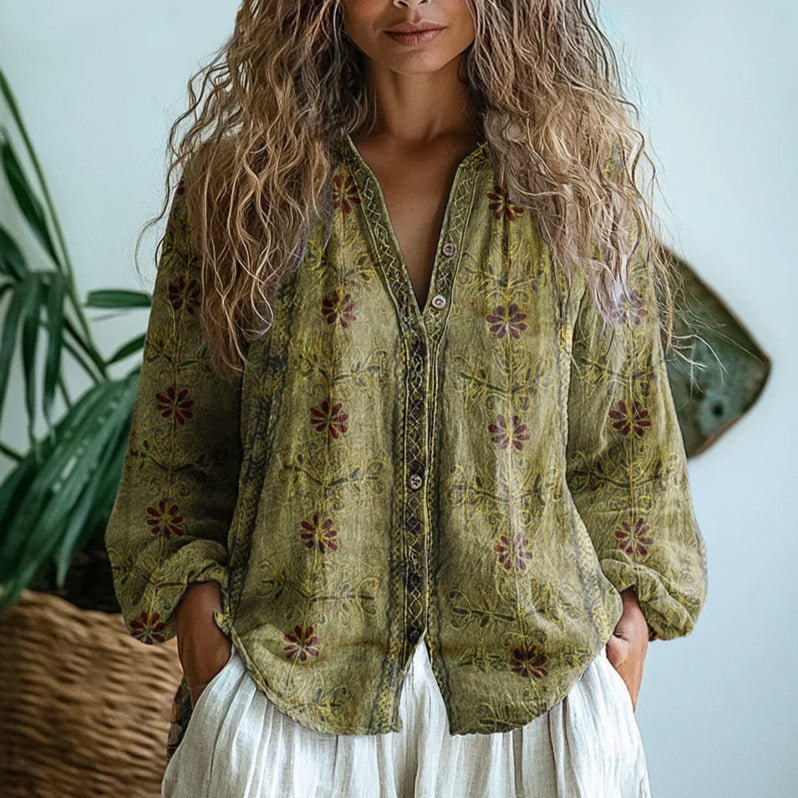 Comfortable women's relaxed fit blouse with versatile nature print, perfect for any occasion.