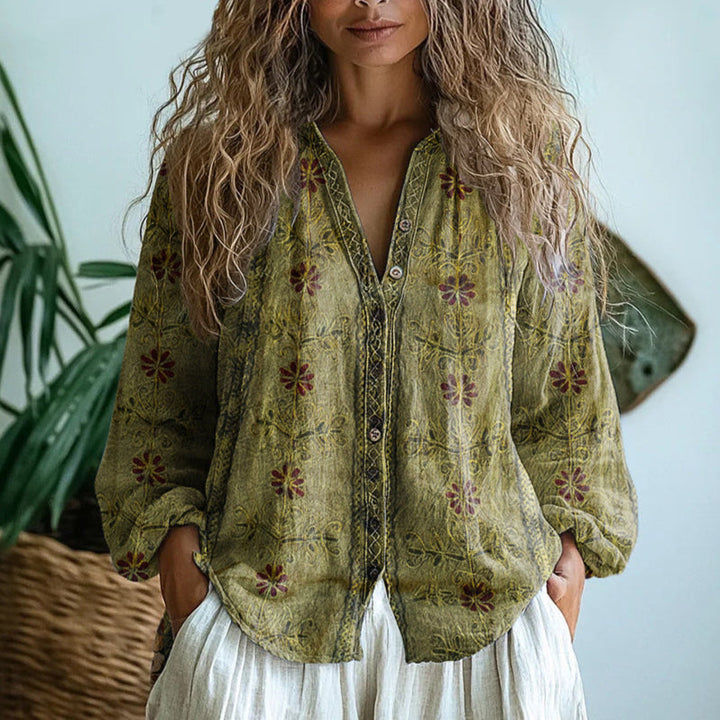 Comfortable women's relaxed fit blouse with versatile nature print, perfect for any occasion.