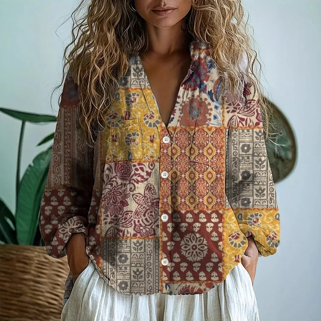 Chic women's relaxed blouse featuring an elegant botanical nature print, comfortable for daily wear.