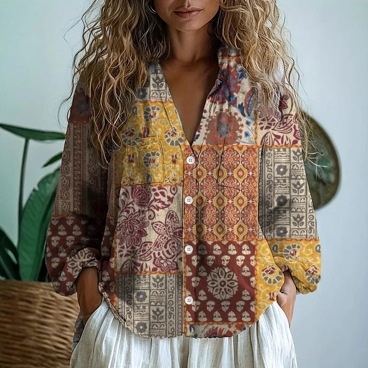 Chic women's relaxed blouse featuring an elegant botanical nature print, comfortable for daily wear.