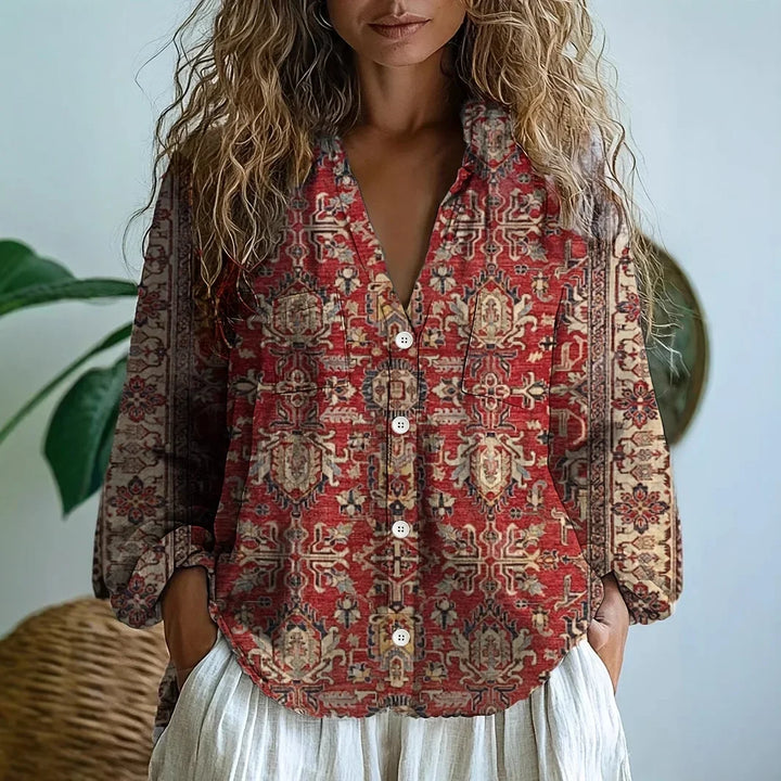 Women's long sleeve blouse, relaxed fit, adorned with a sophisticated botanical nature print.