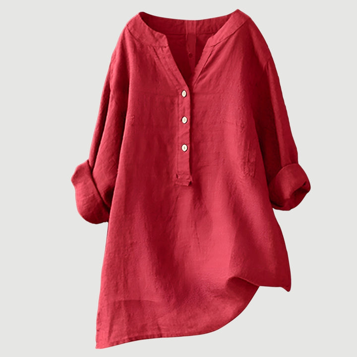 Women's relaxed fit button-up tunic. Comfortable long sleeve top, perfect for effortless casual style.