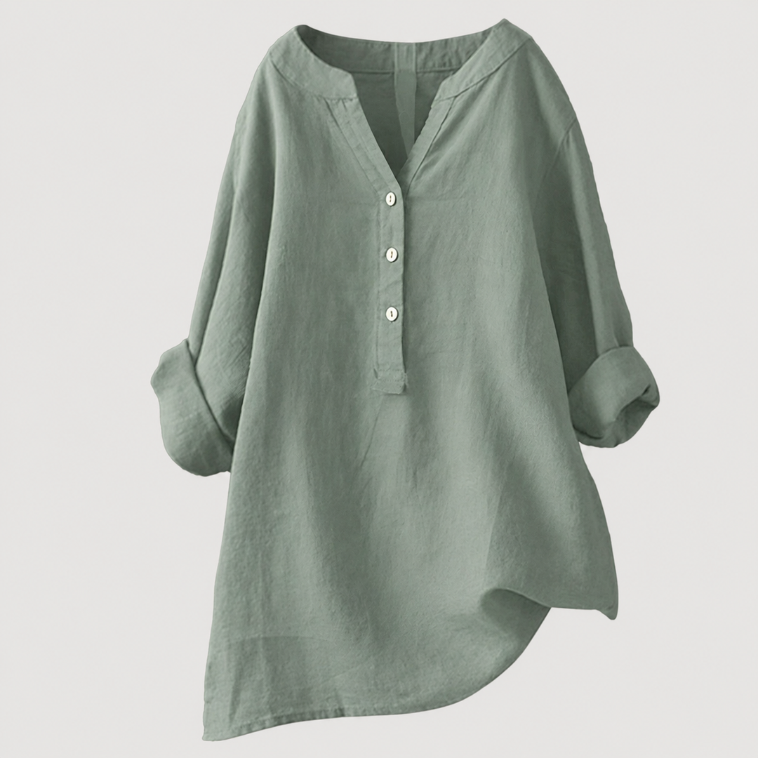 Stylish women's relaxed button tunic. Long sleeve, comfortable, and versatile for any casual occasion.