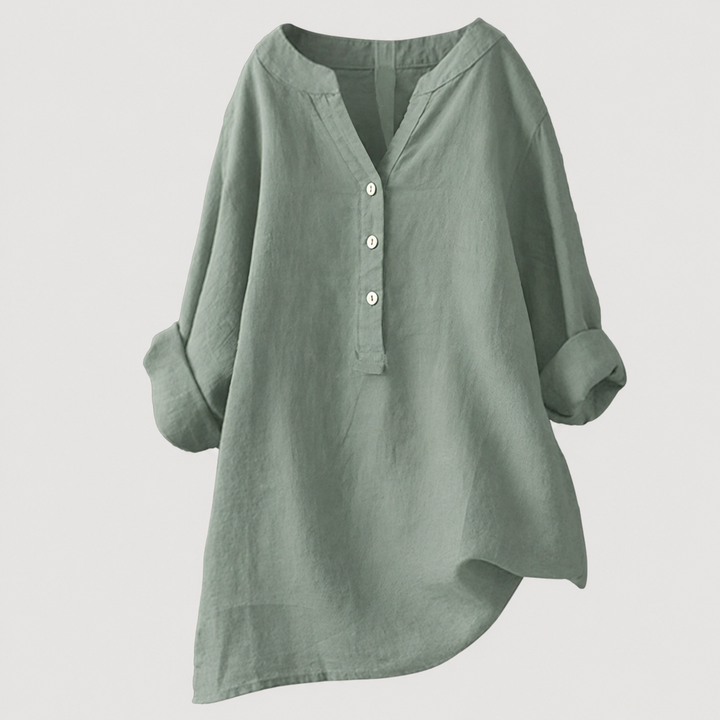 Stylish women's relaxed button tunic. Long sleeve, comfortable, and versatile for any casual occasion.