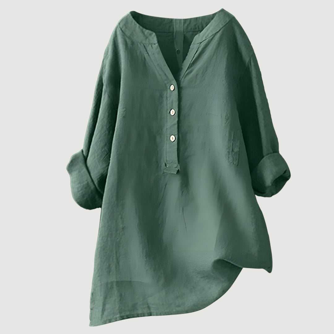 Plus size women's relaxed button tunic. Comfortable long sleeve top, offering effortless and versatile style.