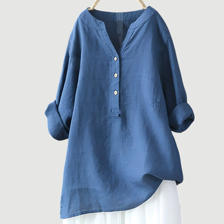 Effortless style with this women's relaxed button tunic. Versatile long sleeve top for casual elegant looks.