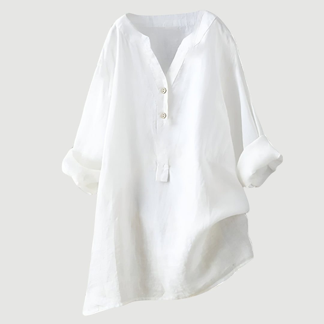 Women's long sleeve relaxed fit button tunic. Comfortable & versatile top for casual elegant everyday wear.