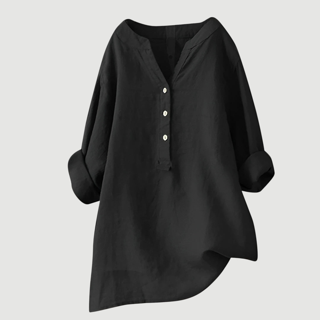 Relaxed fit women's button tunic. Comfortable long sleeve top for versatile, effortless everyday style.