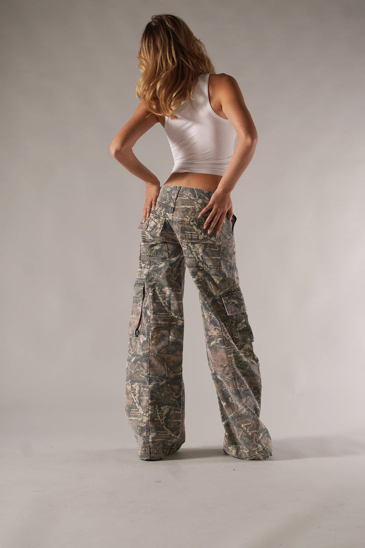 Utility-style women's camo cargo pants with relaxed fit, practical pockets, ideal for casual wear.