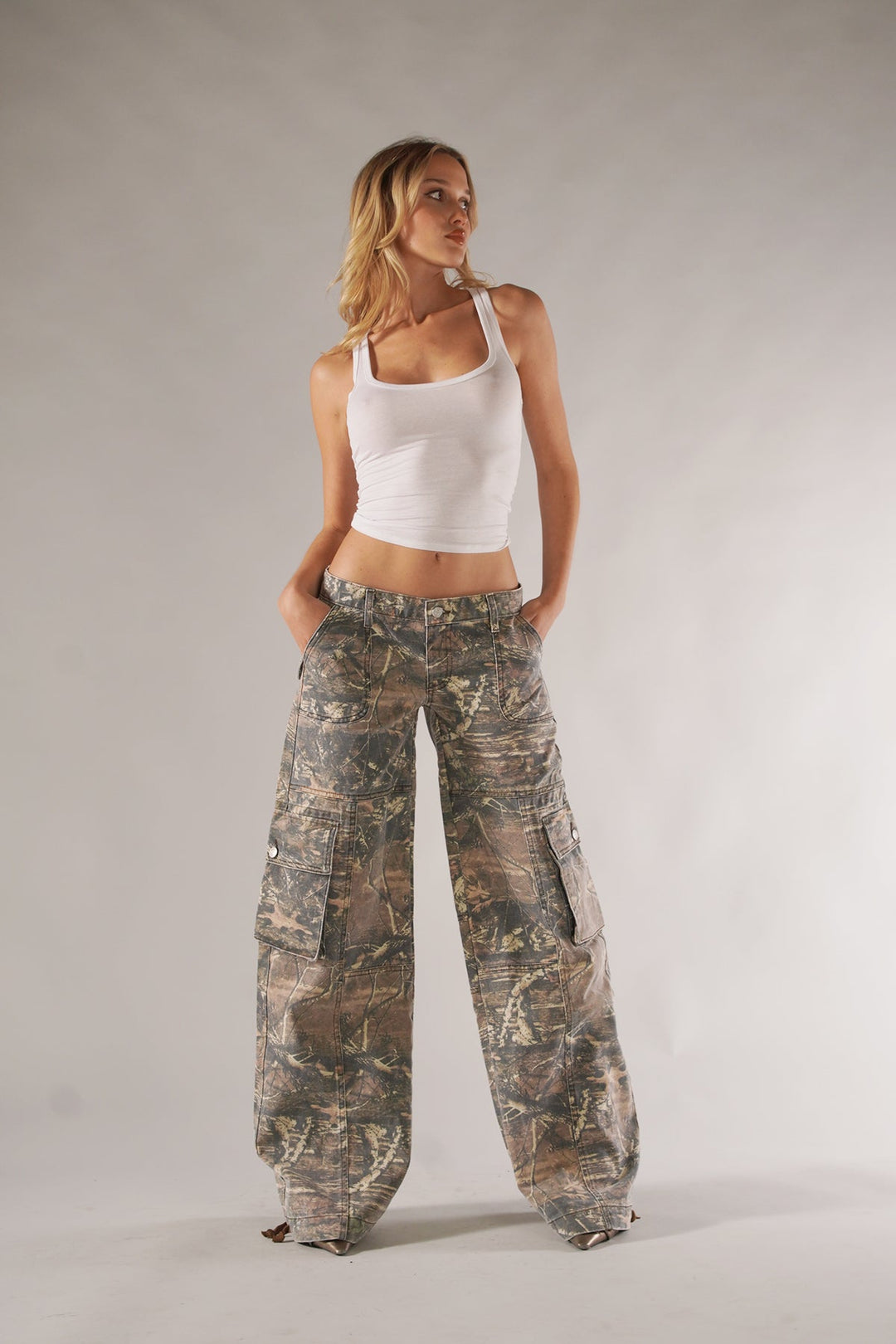 Womens fashion relaxed fit camo trousers, cargo style with multiple utility pockets, comfortable bottoms.