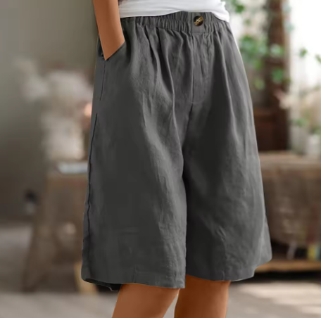 Comfortable women's relaxed fit shorts with flexible waist, perfect for warm weather & daily wear.