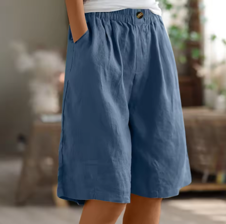 Woman wearing relaxed fit comfort shorts, ideal for warm weather, casual outings or lounging.