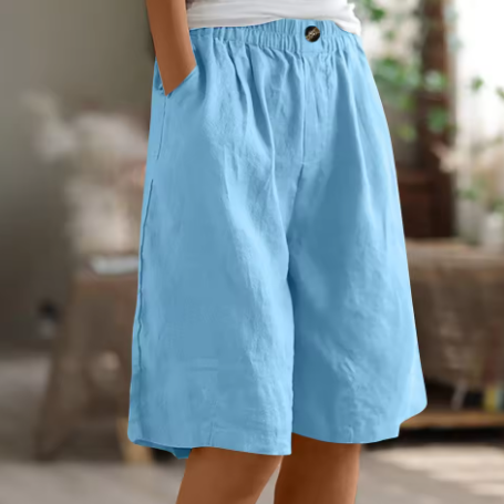 Relaxed fit women's comfort shorts with flexible waist, designed for everyday style & warm weather.