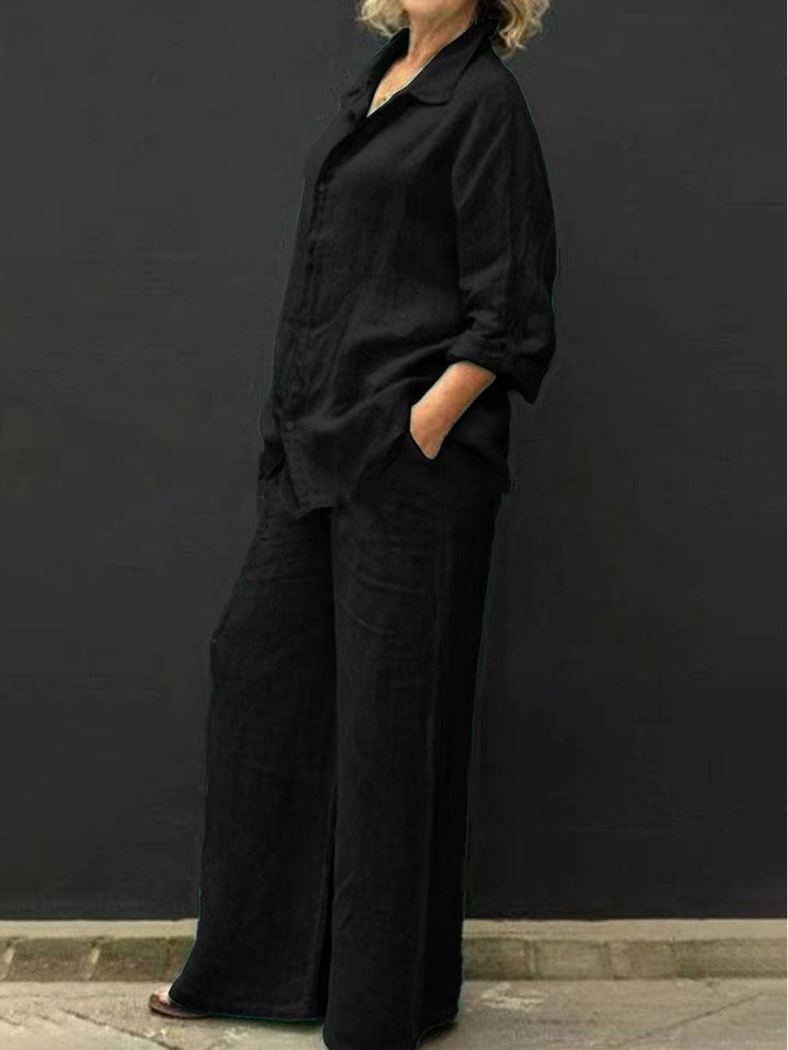 Women's two-piece cotton-linen summer suit featuring a relaxed fit jacket and matching pants for all-day comfort.