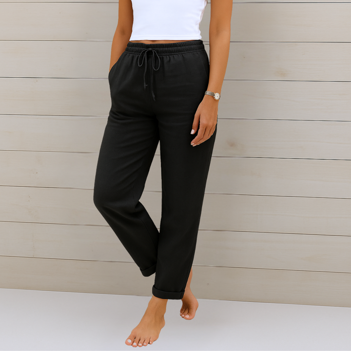 Flattering women's relaxed fit trousers, featuring a comfortable elastic waist for stylish bottom wear.