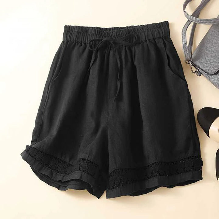 Stylish high-waist women's embroidered shorts in a relaxed fit, ideal for effortless summer style.