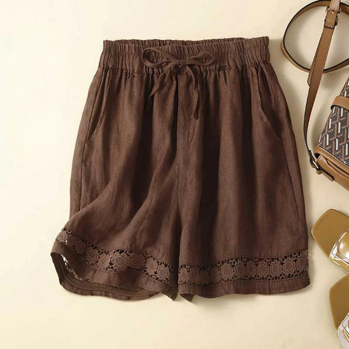 Versatile black women's relaxed embroidered shorts, great for casual outings & comfortable summer fashion.