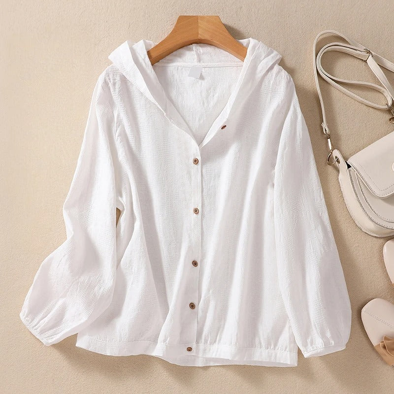 Women's relaxed fit hooded shirt in a soft fabric, perfect for casual everyday style and comfort.