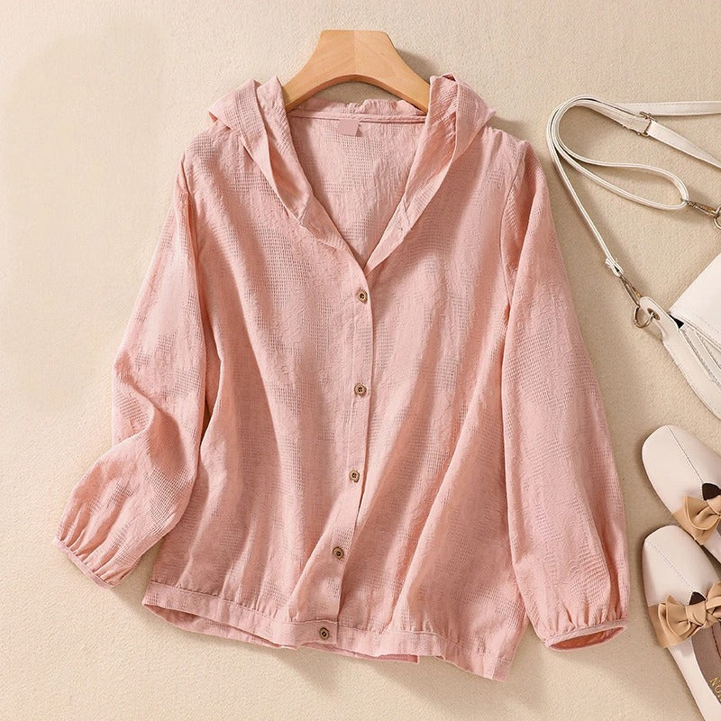 Comfortable women's long sleeve hooded shirt with a flattering relaxed fit, ideal for versatile casual wear.