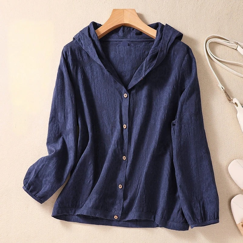 Chic women's hooded top for effortless everyday style; a versatile relaxed fit long sleeve shirt for comfort.