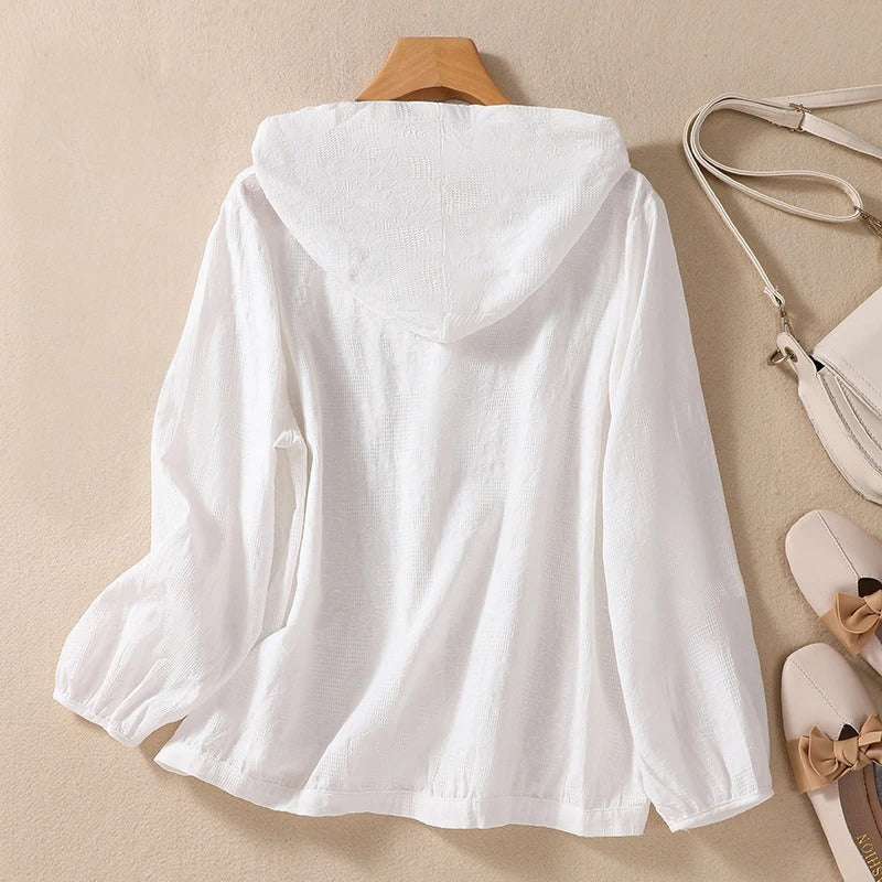 Soft women's relaxed hooded shirt, a comfortable long sleeve top designed for flattering casual everyday wear.