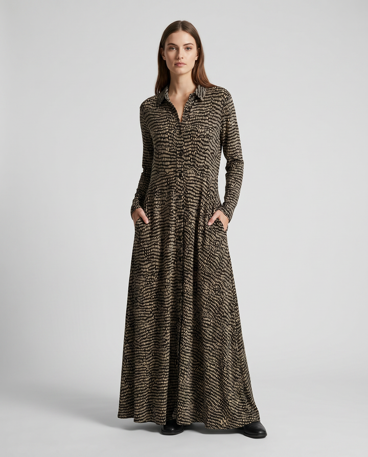 Comfy women's relaxed fit maxi dress, featuring a flattering V-neck, handy pockets, and versatile long design.