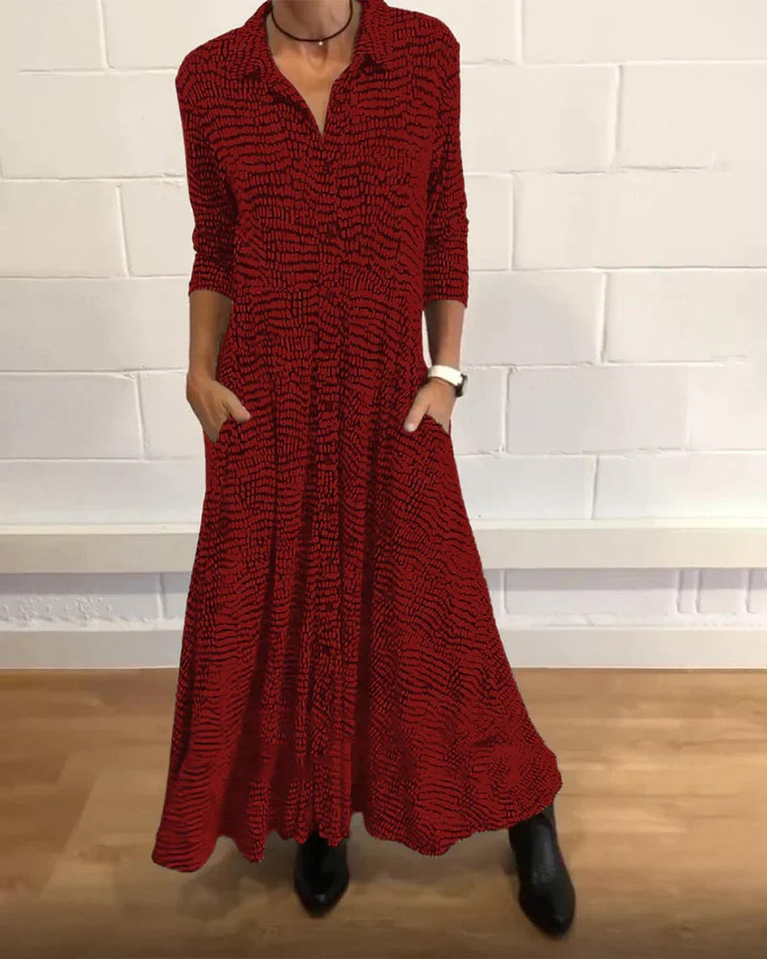 Full-length women's relaxed fit maxi dress. Features a V-neck, comfy design, and practical pockets for all-season style.