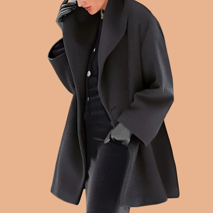 Open-front women's relaxed city jacket, a modern oversized coat for versatile fall & winter fashion and comfort.