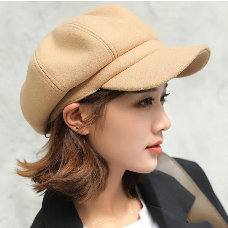 Retro balloon hat for women in a vintage style. Warm cotton winter fashion accessory.