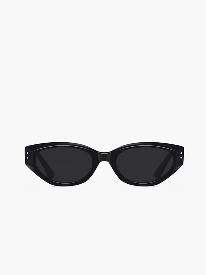 Sleek black cat-eye sunglasses for women, trendy retro eyewear, perfect fashion accessory.