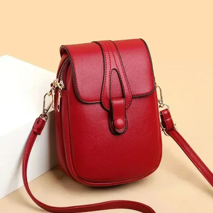 Elegant women's leather shoulder bag in retro style, a versatile vintage handbag for daily use.