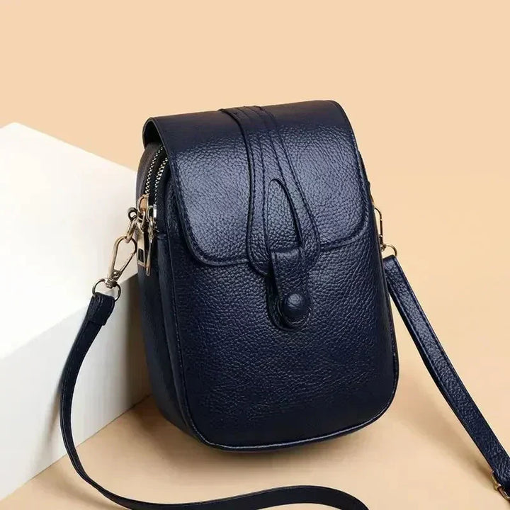 Stylish retro women's leather shoulder bag with vintage appeal, an elegant and functional everyday accessory.